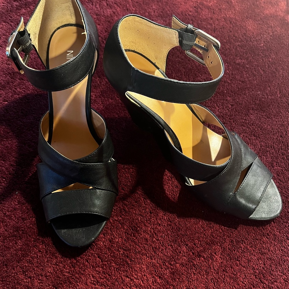 Nine West black wedges with 4” heel.